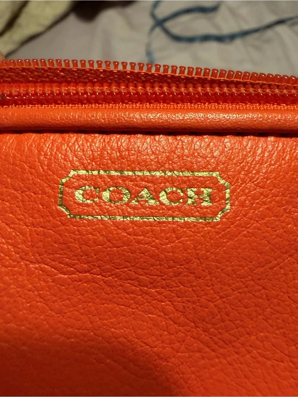 Coach Orange Leather Wristlet Clutch with Gold Hardware